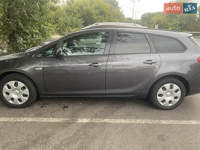 Серый Опель Астра, объемом двигателя 1.6 л и пробегом 140 тыс. км за 8400 $, фото 12 на Automoto.ua