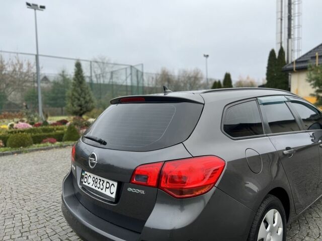 Серый Опель Астра, объемом двигателя 1.2 л и пробегом 264 тыс. км за 4750 $, фото 21 на Automoto.ua