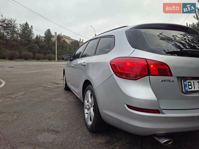 Сірий Опель Астра, об'ємом двигуна 1.4 л та пробігом 300 тис. км за 6400 $, фото 9 на Automoto.ua