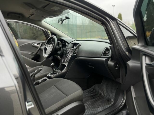 Серый Опель Астра, объемом двигателя 1.2 л и пробегом 264 тыс. км за 4750 $, фото 12 на Automoto.ua