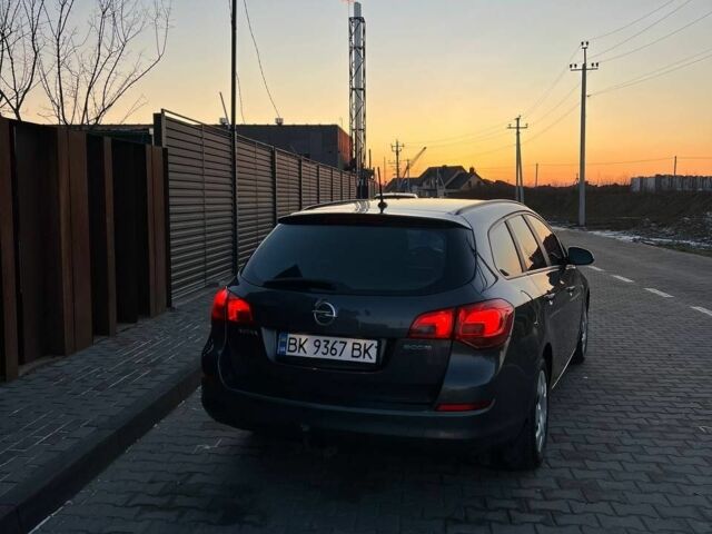Серый Опель Астра, объемом двигателя 1.3 л и пробегом 291 тыс. км за 5600 $, фото 2 на Automoto.ua