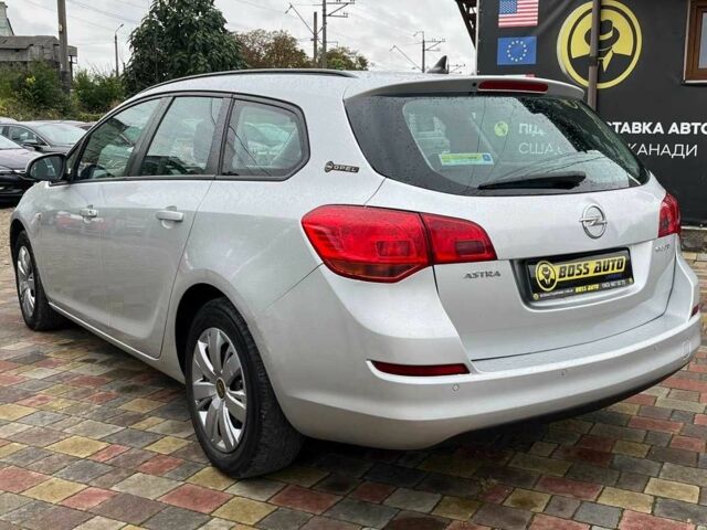 Серый Опель Астра, объемом двигателя 1.3 л и пробегом 238 тыс. км за 5499 $, фото 4 на Automoto.ua