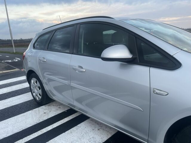 Серый Опель Астра, объемом двигателя 1.2 л и пробегом 255 тыс. км за 5700 $, фото 3 на Automoto.ua