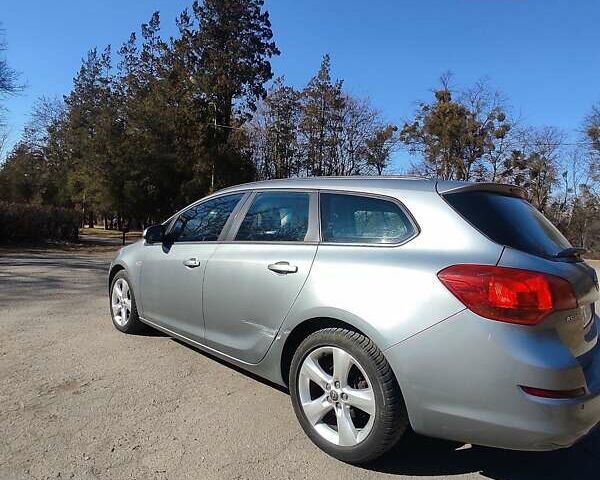 Серый Опель Астра, объемом двигателя 1.3 л и пробегом 251 тыс. км за 5500 $, фото 5 на Automoto.ua