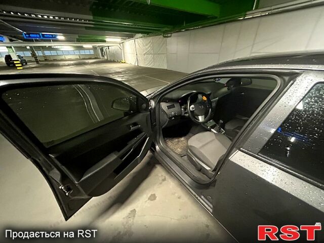 Серый Опель Астра, объемом двигателя 1.6 л и пробегом 144 тыс. км за 5300 $, фото 6 на Automoto.ua