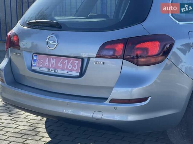 Серый Опель Астра, объемом двигателя 1.7 л и пробегом 259 тыс. км за 7700 $, фото 20 на Automoto.ua