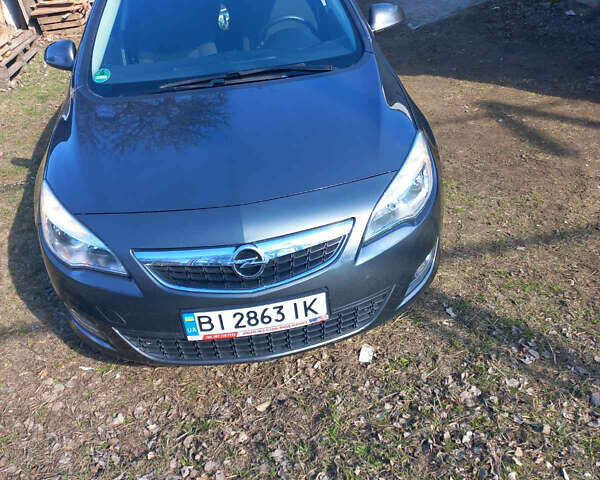 Серый Опель Астра, объемом двигателя 1.6 л и пробегом 140 тыс. км за 8400 $, фото 3 на Automoto.ua