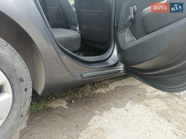 Серый Опель Астра, объемом двигателя 1.4 л и пробегом 180 тыс. км за 6500 $, фото 4 на Automoto.ua