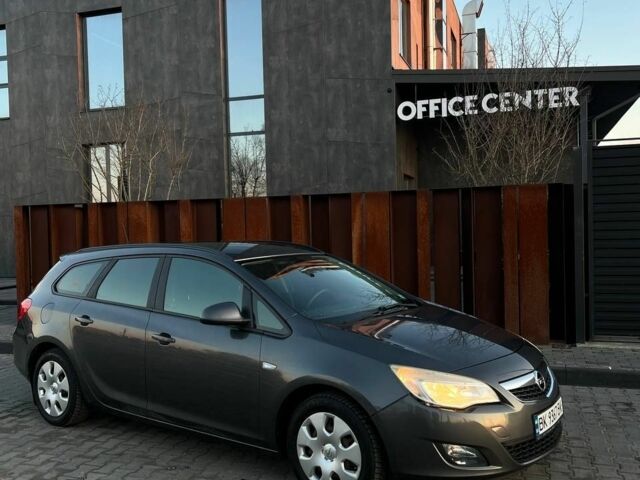 Серый Опель Астра, объемом двигателя 1.3 л и пробегом 291 тыс. км за 5600 $, фото 1 на Automoto.ua