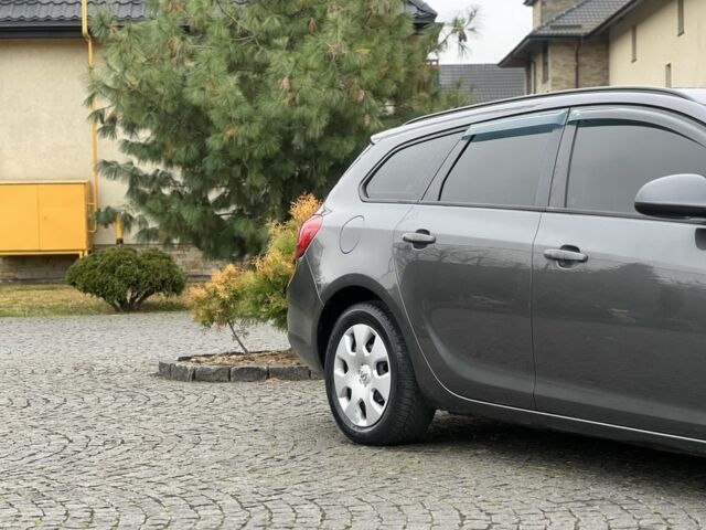 Серый Опель Астра, объемом двигателя 1.2 л и пробегом 264 тыс. км за 4750 $, фото 3 на Automoto.ua