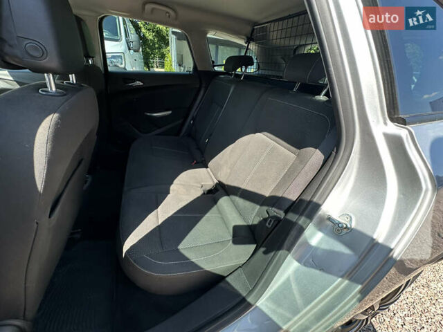 Серый Опель Астра, объемом двигателя 1.7 л и пробегом 183 тыс. км за 7900 $, фото 20 на Automoto.ua