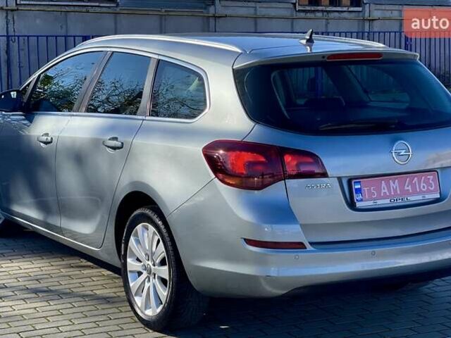 Серый Опель Астра, объемом двигателя 1.7 л и пробегом 259 тыс. км за 7700 $, фото 17 на Automoto.ua