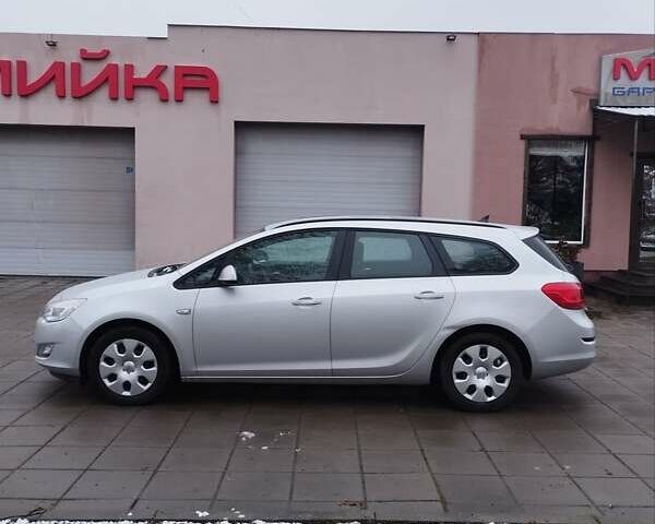 Серый Опель Астра, объемом двигателя 1.3 л и пробегом 236 тыс. км за 6950 $, фото 2 на Automoto.ua