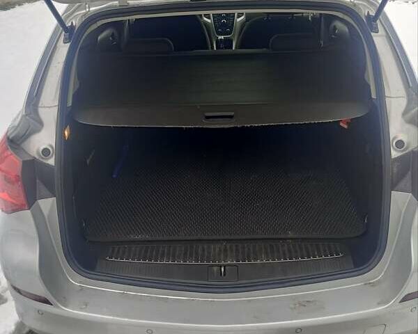 Серый Опель Астра, объемом двигателя 1.7 л и пробегом 206 тыс. км за 7499 $, фото 8 на Automoto.ua