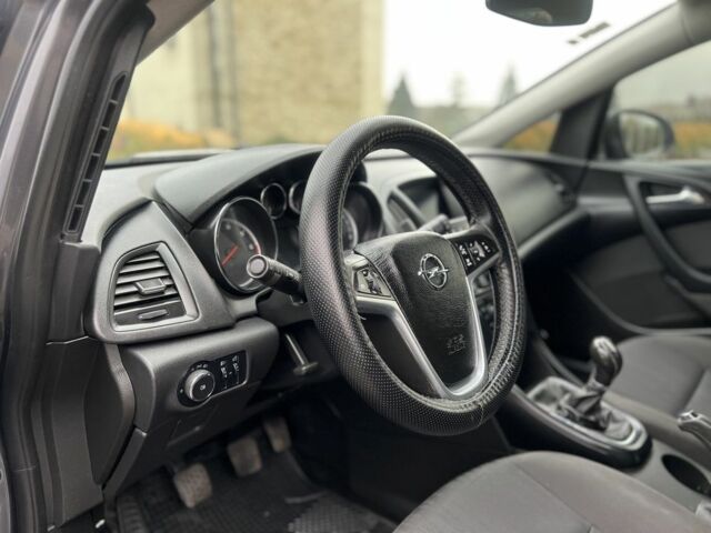 Серый Опель Астра, объемом двигателя 1.2 л и пробегом 264 тыс. км за 4750 $, фото 11 на Automoto.ua