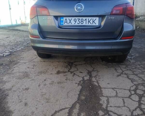Серый Опель Астра, объемом двигателя 1.7 л и пробегом 265 тыс. км за 6499 $, фото 5 на Automoto.ua