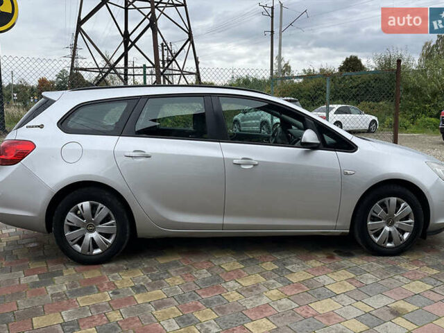 Серый Опель Астра, объемом двигателя 1.25 л и пробегом 238 тыс. км за 5499 $, фото 7 на Automoto.ua