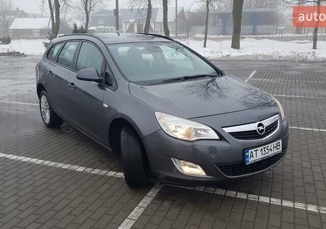 Серый Опель Астра, объемом двигателя 1.3 л и пробегом 310 тыс. км за 5750 $, фото 5 на Automoto.ua