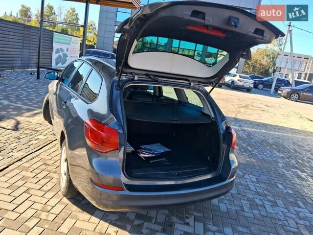 Серый Опель Астра, объемом двигателя 1.6 л и пробегом 176 тыс. км за 7200 $, фото 11 на Automoto.ua