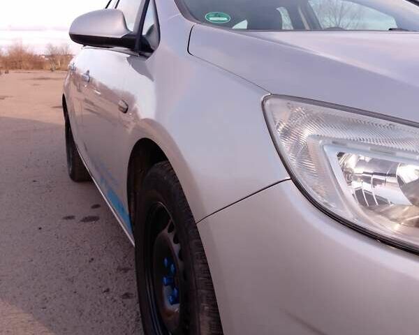 Серый Опель Астра, объемом двигателя 1.4 л и пробегом 183 тыс. км за 5700 $, фото 6 на Automoto.ua