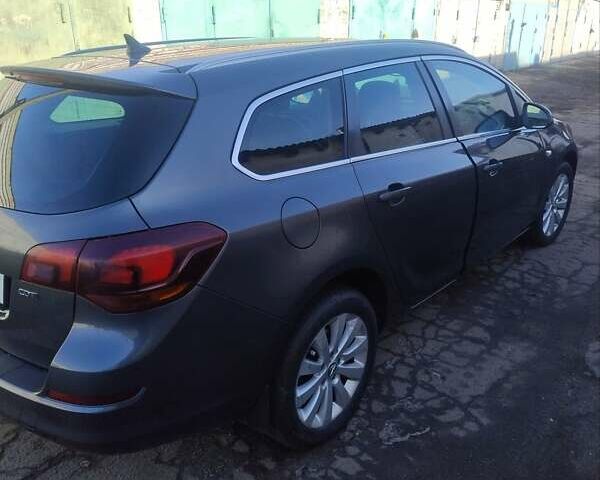 Серый Опель Астра, объемом двигателя 1.7 л и пробегом 265 тыс. км за 6499 $, фото 2 на Automoto.ua