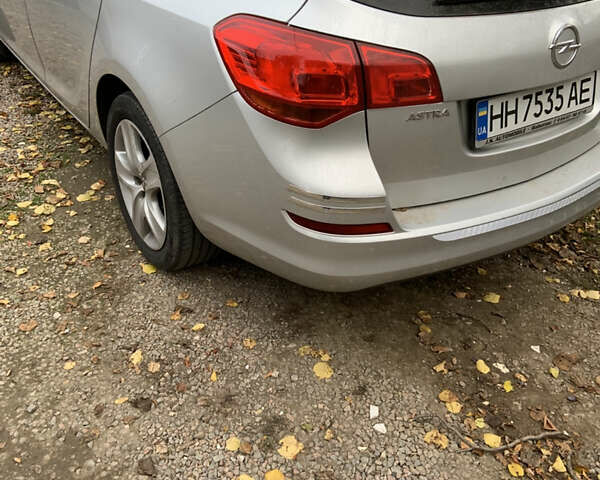 Серый Опель Астра, объемом двигателя 1.69 л и пробегом 230 тыс. км за 7600 $, фото 8 на Automoto.ua