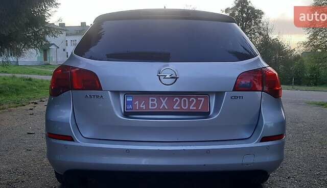 Серый Опель Астра, объемом двигателя 1.7 л и пробегом 248 тыс. км за 6950 $, фото 11 на Automoto.ua