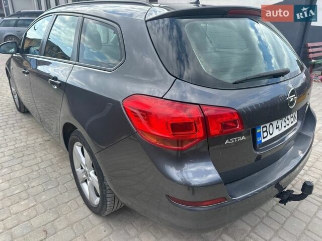 Серый Опель Астра, объемом двигателя 1.69 л и пробегом 248 тыс. км за 6950 $, фото 4 на Automoto.ua