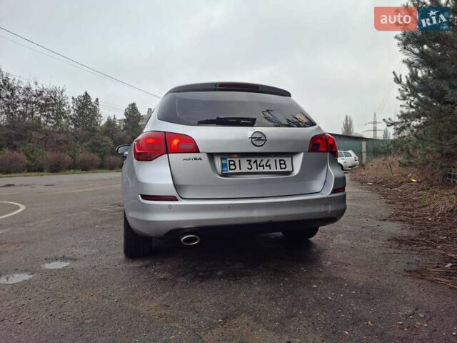 Сірий Опель Астра, об'ємом двигуна 1.4 л та пробігом 300 тис. км за 6400 $, фото 8 на Automoto.ua