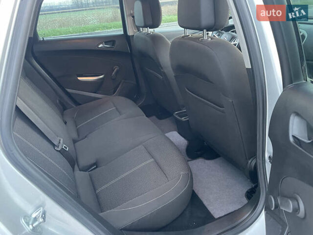 Серый Опель Астра, объемом двигателя 1.3 л и пробегом 255 тыс. км за 5700 $, фото 9 на Automoto.ua