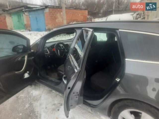 Серый Опель Астра, объемом двигателя 1.2 л и пробегом 275 тыс. км за 5000 $, фото 2 на Automoto.ua