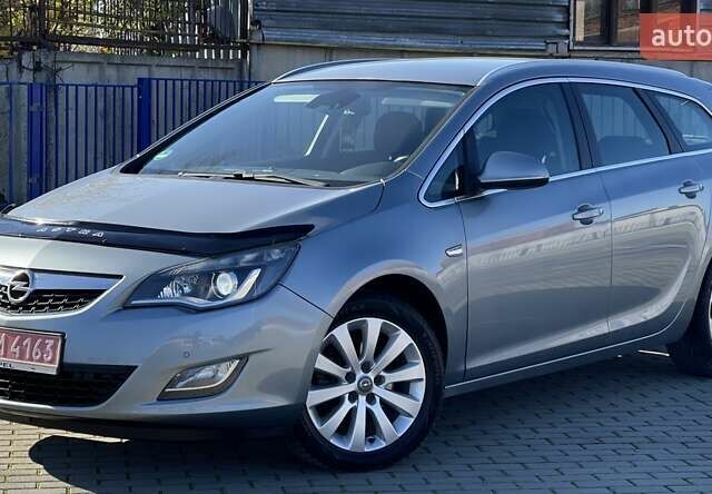 Серый Опель Астра, объемом двигателя 1.7 л и пробегом 259 тыс. км за 7700 $, фото 3 на Automoto.ua