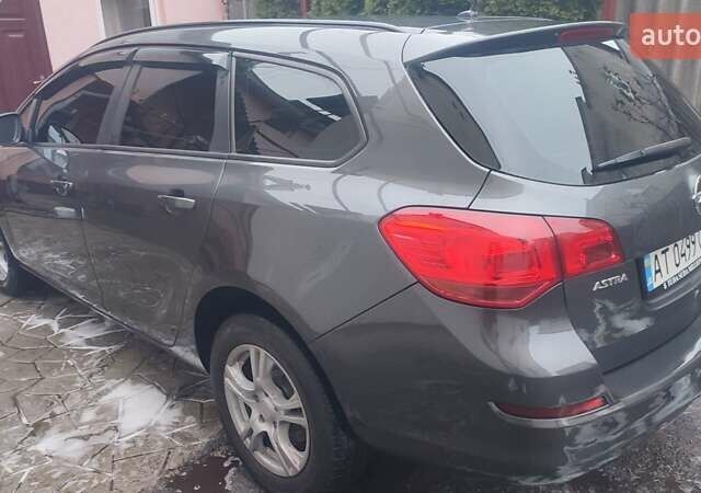 Сірий Опель Астра, об'ємом двигуна 1.7 л та пробігом 412 тис. км за 6400 $, фото 13 на Automoto.ua