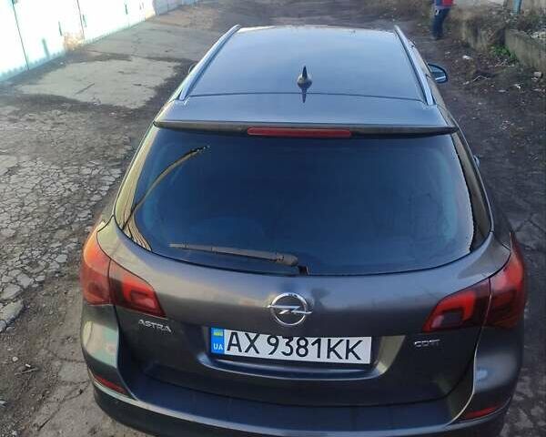 Серый Опель Астра, объемом двигателя 1.7 л и пробегом 265 тыс. км за 6499 $, фото 4 на Automoto.ua