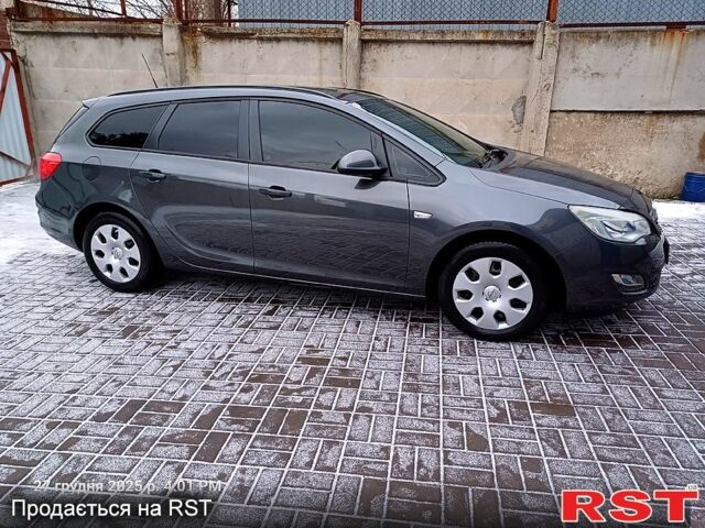 Сірий Опель Астра, об'ємом двигуна 1.2 л та пробігом 220 тис. км за 5999 $, фото 2 на Automoto.ua