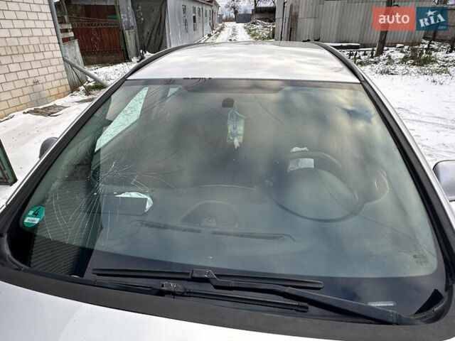 Серый Опель Астра, объемом двигателя 1.69 л и пробегом 249 тыс. км за 3350 $, фото 26 на Automoto.ua