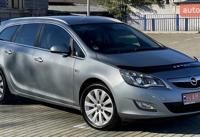 Серый Опель Астра, объемом двигателя 1.7 л и пробегом 259 тыс. км за 7700 $, фото 11 на Automoto.ua