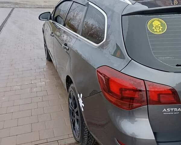 Серый Опель Астра, объемом двигателя 1.7 л и пробегом 236 тыс. км за 7200 $, фото 8 на Automoto.ua