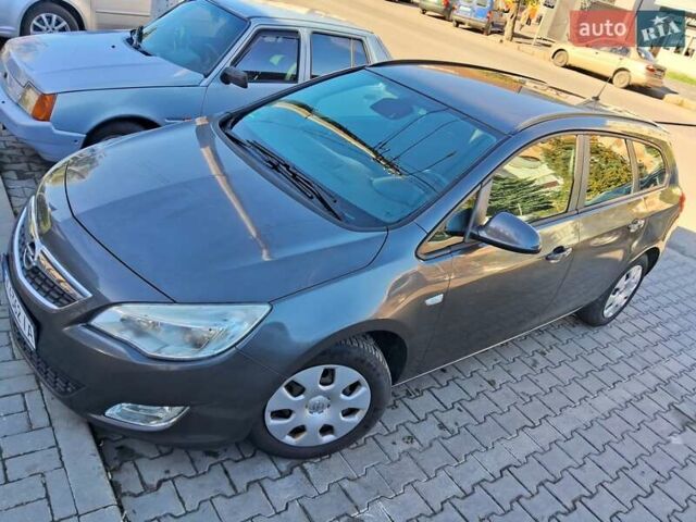 Серый Опель Астра, объемом двигателя 1.6 л и пробегом 176 тыс. км за 7200 $, фото 8 на Automoto.ua