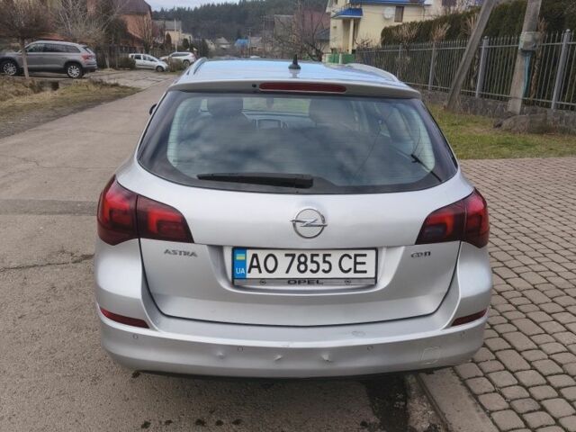 Серый Опель Астра, объемом двигателя 1.7 л и пробегом 253 тыс. км за 6000 $, фото 7 на Automoto.ua