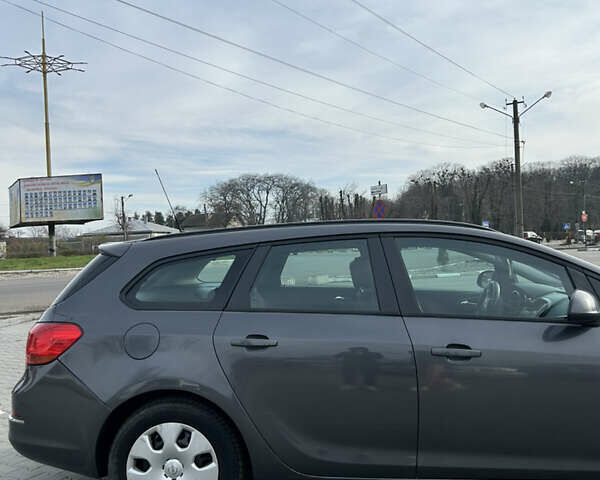 Серый Опель Астра, объемом двигателя 1.3 л и пробегом 278 тыс. км за 5800 $, фото 4 на Automoto.ua