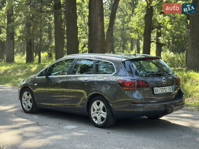 Сірий Опель Астра, об'ємом двигуна 1.69 л та пробігом 160 тис. км за 6000 $, фото 8 на Automoto.ua