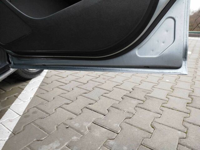 Серый Опель Астра, объемом двигателя 1.2 л и пробегом 254 тыс. км за 5000 $, фото 8 на Automoto.ua