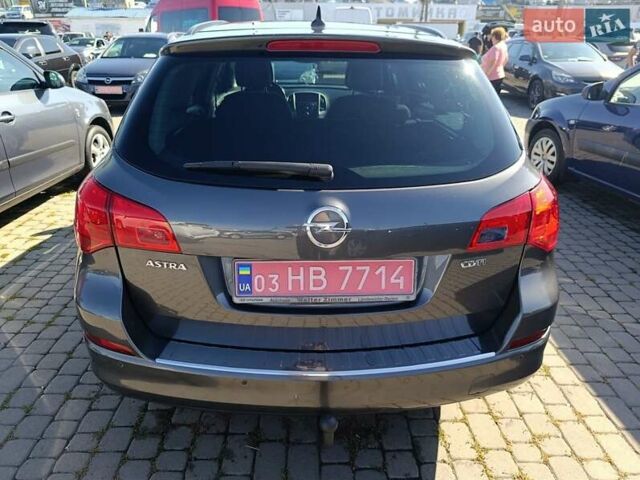 Серый Опель Астра, объемом двигателя 1.7 л и пробегом 196 тыс. км за 7100 $, фото 3 на Automoto.ua