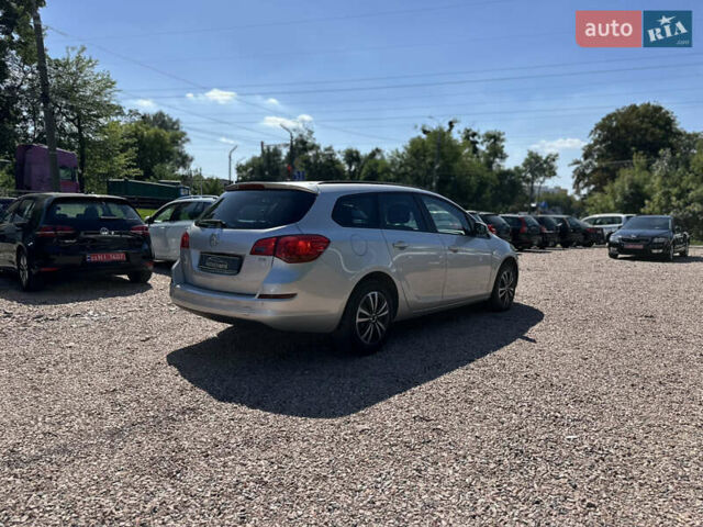 Серый Опель Астра, объемом двигателя 1.7 л и пробегом 183 тыс. км за 7950 $, фото 8 на Automoto.ua