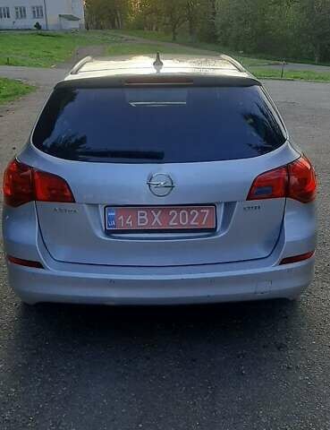 Серый Опель Астра, объемом двигателя 1.7 л и пробегом 248 тыс. км за 6950 $, фото 9 на Automoto.ua