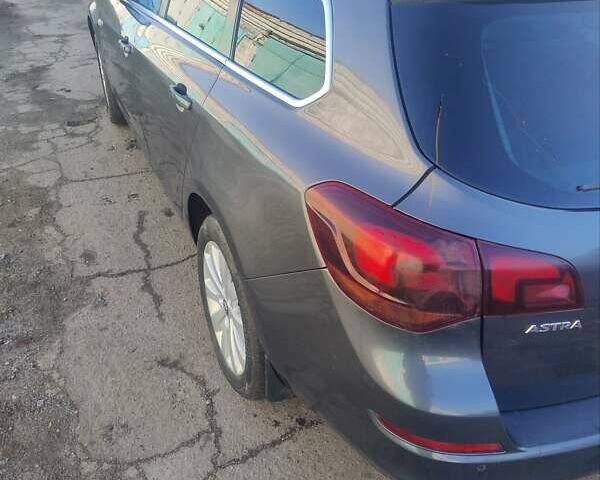 Серый Опель Астра, объемом двигателя 1.7 л и пробегом 265 тыс. км за 6499 $, фото 3 на Automoto.ua