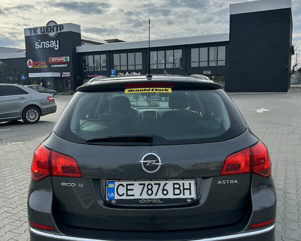 Серый Опель Астра, объемом двигателя 1.3 л и пробегом 278 тыс. км за 5800 $, фото 6 на Automoto.ua