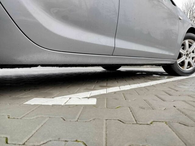 Серый Опель Астра, объемом двигателя 1.2 л и пробегом 254 тыс. км за 5000 $, фото 10 на Automoto.ua