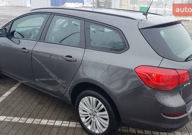 Серый Опель Астра, объемом двигателя 1.3 л и пробегом 310 тыс. км за 5750 $, фото 17 на Automoto.ua